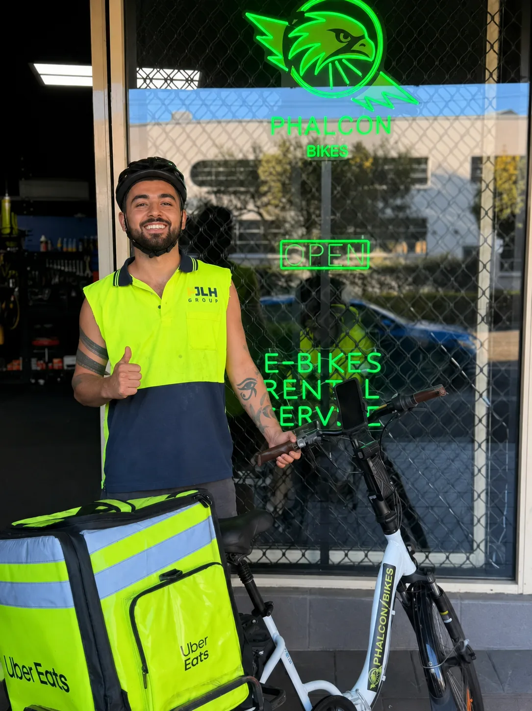 Phalcon delivery rider on an E-Bike in Chippendale, Sydney