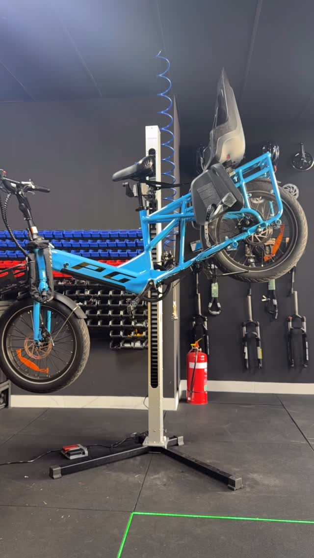 A customer brought his cargo bike in for a quick brake check to make sure it was safe for the school